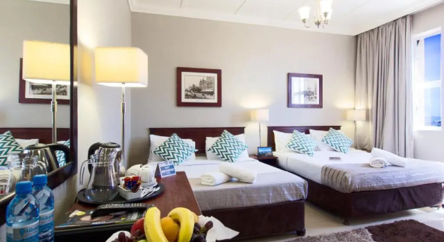 Четырёхместный номер Standard Albany Hotel