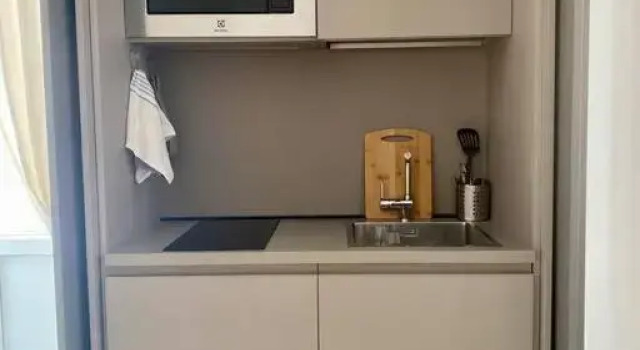 Апартаменты Cozy new studio in the center of Sanremo with balcony