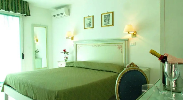 Четырёхместный номер Standard Hotel Oasi
