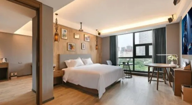 Семейный люкс MEHOOD LESTIE Hotel (Weiyang road Qing Shao Nian Zhong Xin Station)