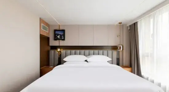Семейный люкс Meilun Hotel (Second Avenue Baihe Store, North Slope Distribution Center, Changbai Mountain)