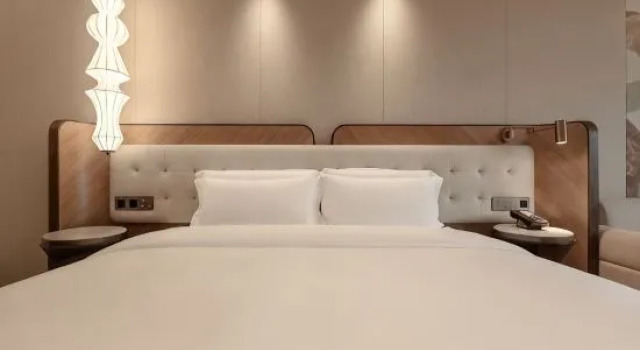 Люкс Qingdao Book K Hotel (Stone Old Man Seaside Bathing Beach)