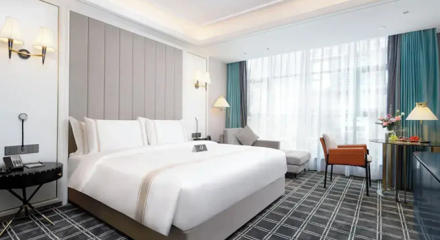Номер Luxury Pazhou XANA Deluxe International Hotel Pazhou Convention and Exhibition Center Nanzhou Metro Station Branch