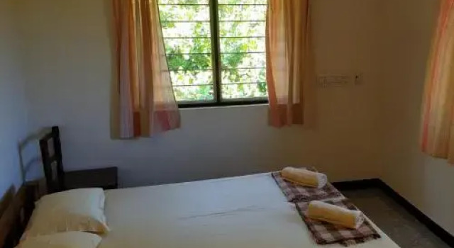 Lotus Garden Guest House, Забронировать Гостевой дом Отели Ауровиль с парковкой, рядом с Matrimandir, Парковка