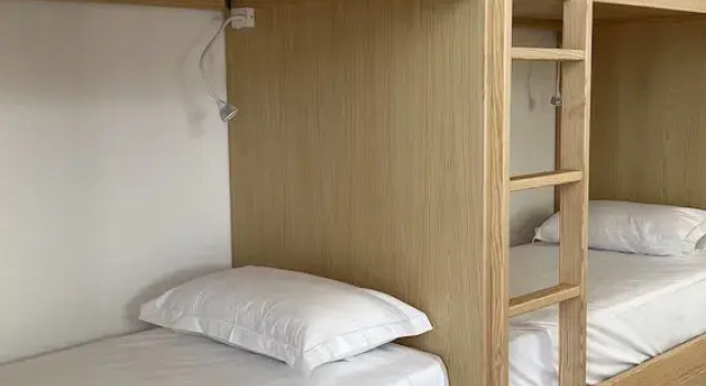 Postel ve společném pokoji s balkonem Hostel Matriz 55