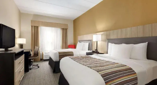 Шестиместный номер Standard Country Inn & Suites by Radisson, Dalton, GA