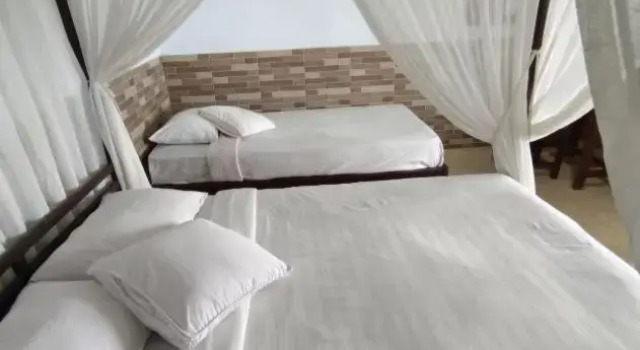 Двухместный номер Deluxe с балконом Puri Sunset Homestay