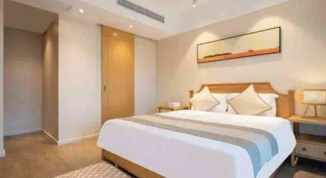Люкс Luxury с 3 комнатами с балконом и с видом на море Wanning · Qihai Surfing Scenic Apartment (Sunac Riyue Bay)