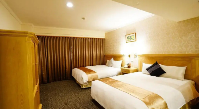 Четырёхместный номер Deluxe Cambridge Tainan Hotel