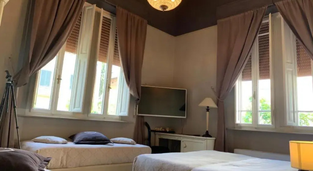 Четырёхместный семейный номер Villa Tower Inn