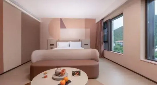 Кровать в общем номере Orange Hotel (Xuzhou Yunlong Lake Sanpeng Square Branch)