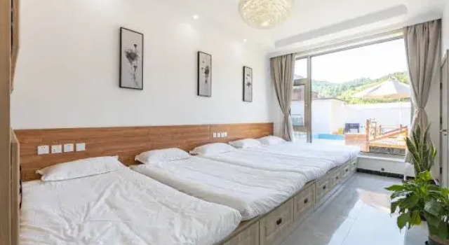 Кровать в общем номере Beijing Youkeshanyuan Homestay