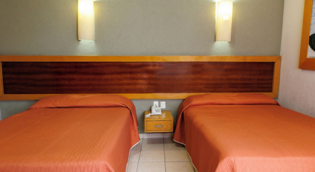 Четырёхместный номер Standard Hotel Qualitel Centro Histórico