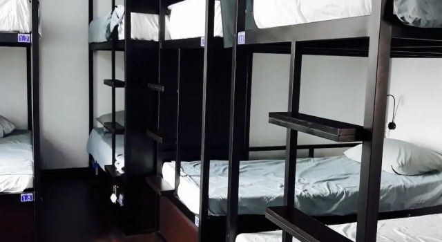 Кровать в общем номере Penthouse Hostel & Spa
