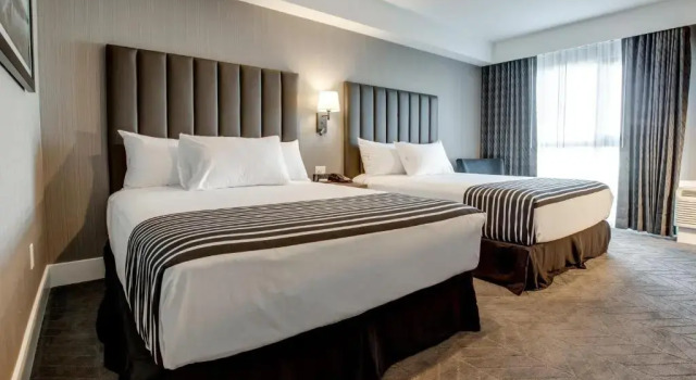 Четырёхместный номер Standard Sandman Signature Saskatoon South Hotel