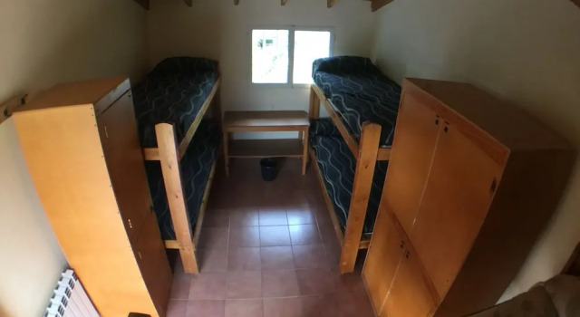 Кровать в общем номере Hostel del Glaciar Pioneros
