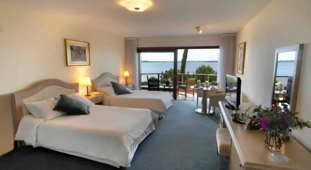 Четырёхместный номер Standard Hotel del Lago Golf & Art Resort