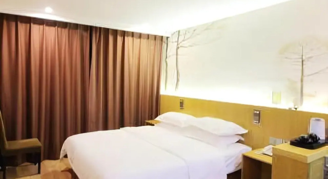 Junpin Coastal Hotel (Qingdao Railway Station Subway Station Zhanqiao Branch)(君品海岸酒店（青岛火车站地铁站栈桥店）)