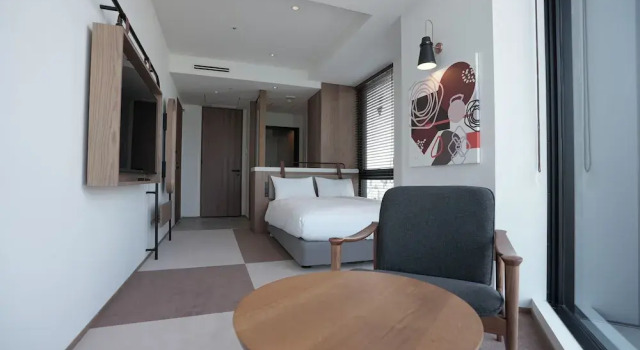 Номер Deluxe CINQS Hotel