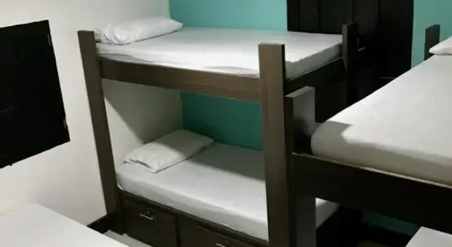 Кровать в общем номере La Quinta Bacana