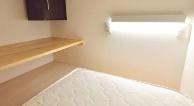 Кровать в общем номере ゲストハウス岐阜羽島心音 Guest House Gifuhashima COCONE
