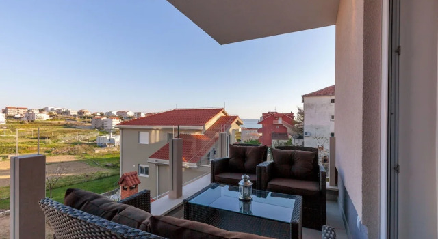 Семейные апартаменты с 2 комнатами с балконом и с видом на море Olive Tree apartments