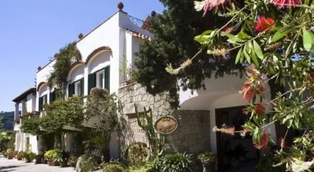 Кровать в общем номере Hotel Villa Melodie