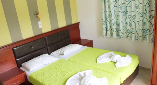 Апартаменты Amoudi Studios Apartments Hotel