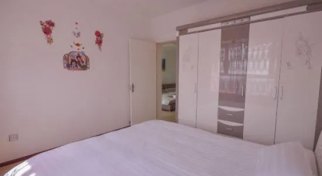 Трёхместный люкс Mengya Family Apartment