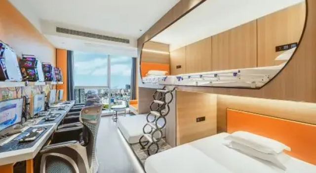 Кровать в общем номере Yijie Electric Sports Hotel