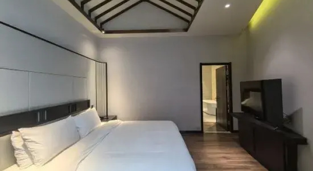 Одноместный люкс с 2 комнатами с видом на внутренний двор Nanjing Olympic Expo Center Jinlingyin Manxin Hotel
