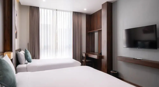 Трёхместный номер Deluxe Eden Hue Hotel