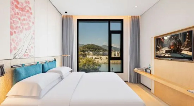 Четырёхместный семейный люкс с 2 комнатами Mochi Hotel Ningbo Xikou