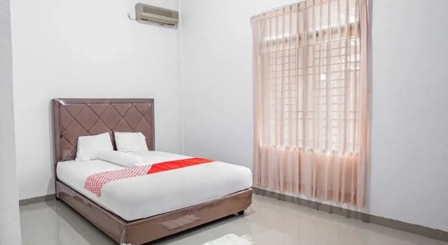 Номер Deluxe Hotel O Homestay Romauli Kampung Radja