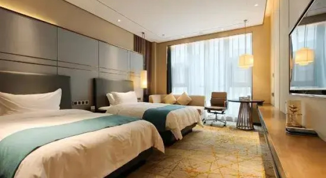 Трёхместный семейный люкс Zhongzhou Huayue International Hotel
