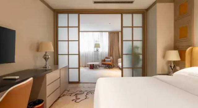 Люкс Deluxe New East Asia Hotel