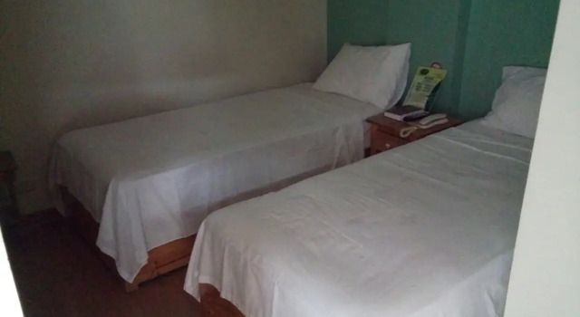 GraceHill EconoSuites Hotel, Забронировать Отель  