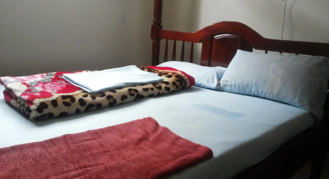 Leam Guesthouse, Boek Hotel Moyo Niall