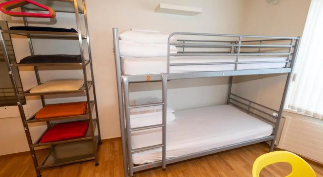 Кровать в общем номере Akureyri Hostel