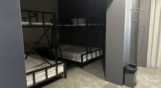 Кровать в общем номере fengxing dianjin jiudian