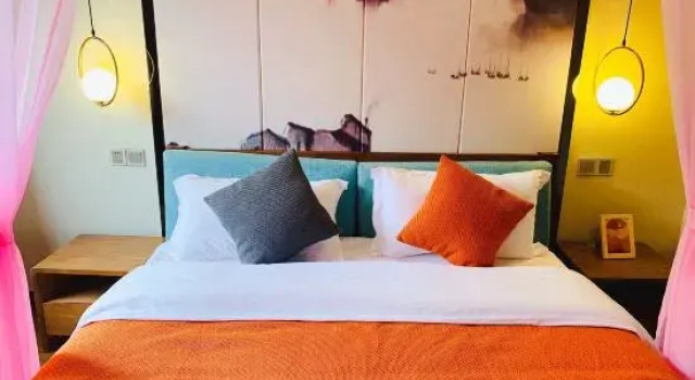 Двухместный люкс с балконом Mount Emei Zuimuki Boutique B&B (Mount Emei Scenic Area Store)