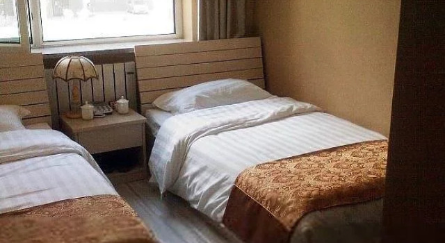 Zhanjiang Zhongtian Business Hotel, Boek Hotel Zhanjiang Guangdong