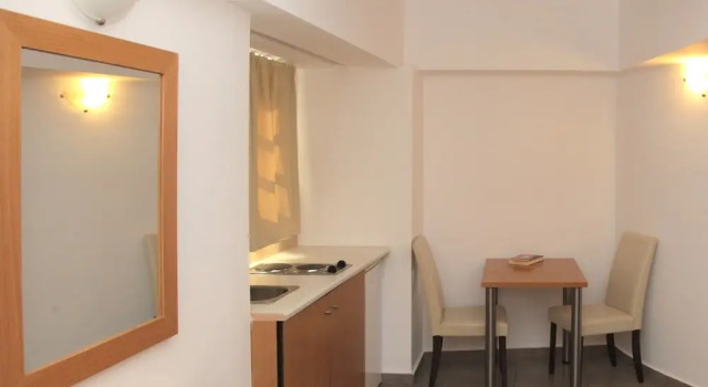Апартаменты с балконом и с видом на город Mimosa Suites