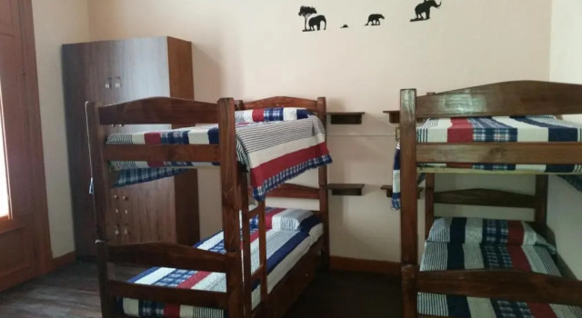 Кровать в общем номере Posada Del Gaucho