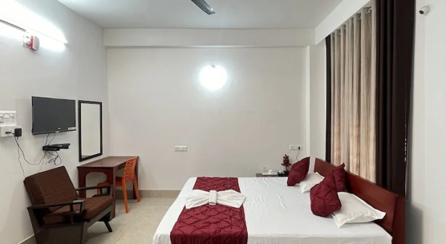 Deluxe quadruple chambre avec balcon USC Homestay