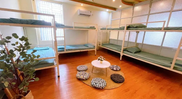 Кровать в общем номере GreenHome Hotel