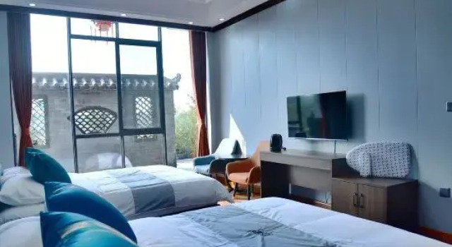 Люкс Leshan Puyue Jiayuan Homestay