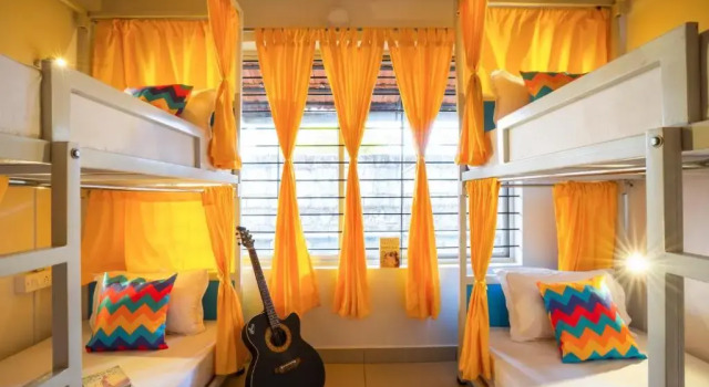 Кровать в общем номере goSTOPS Coorg