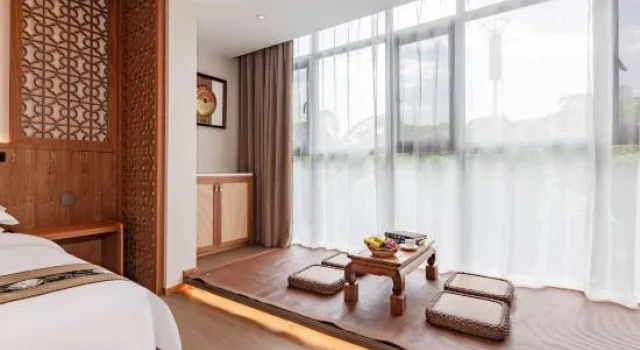 Люкс Mangshi Jiujian Homestay