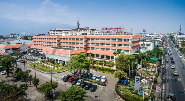 Кровать в общем номере Mercure Chiang Mai